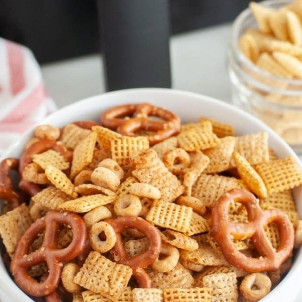 Bowl of Chex mix and an air fryer.