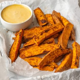 Sweet potato wedges in a basket.