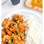Bowl of fried chicken and rice.