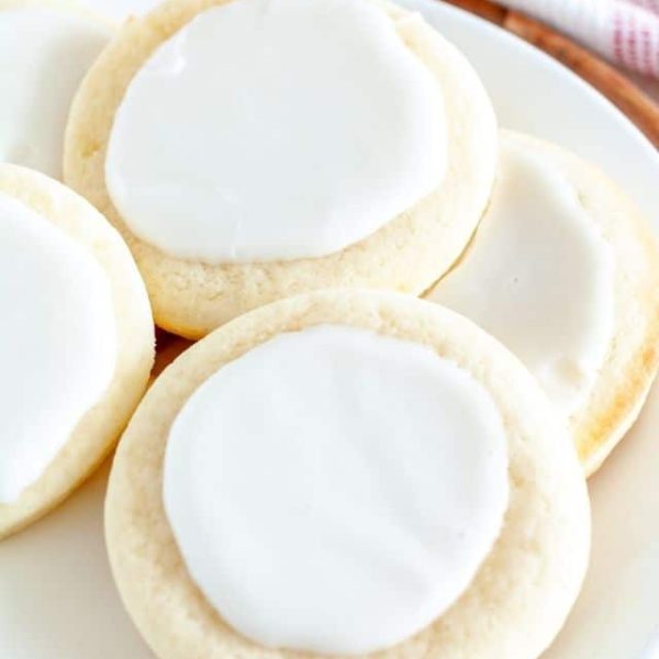 Plate of sugar cookies with frosting.
