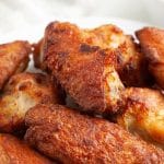 Plate of cooked chicken wings.