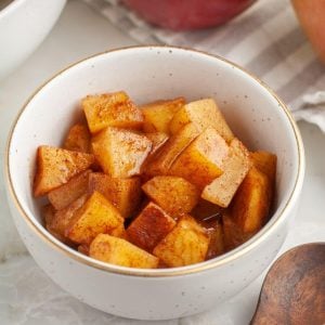 Bowl of diced cinnamon apples.