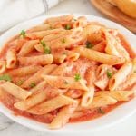 Plate of pasta with blush sauce.