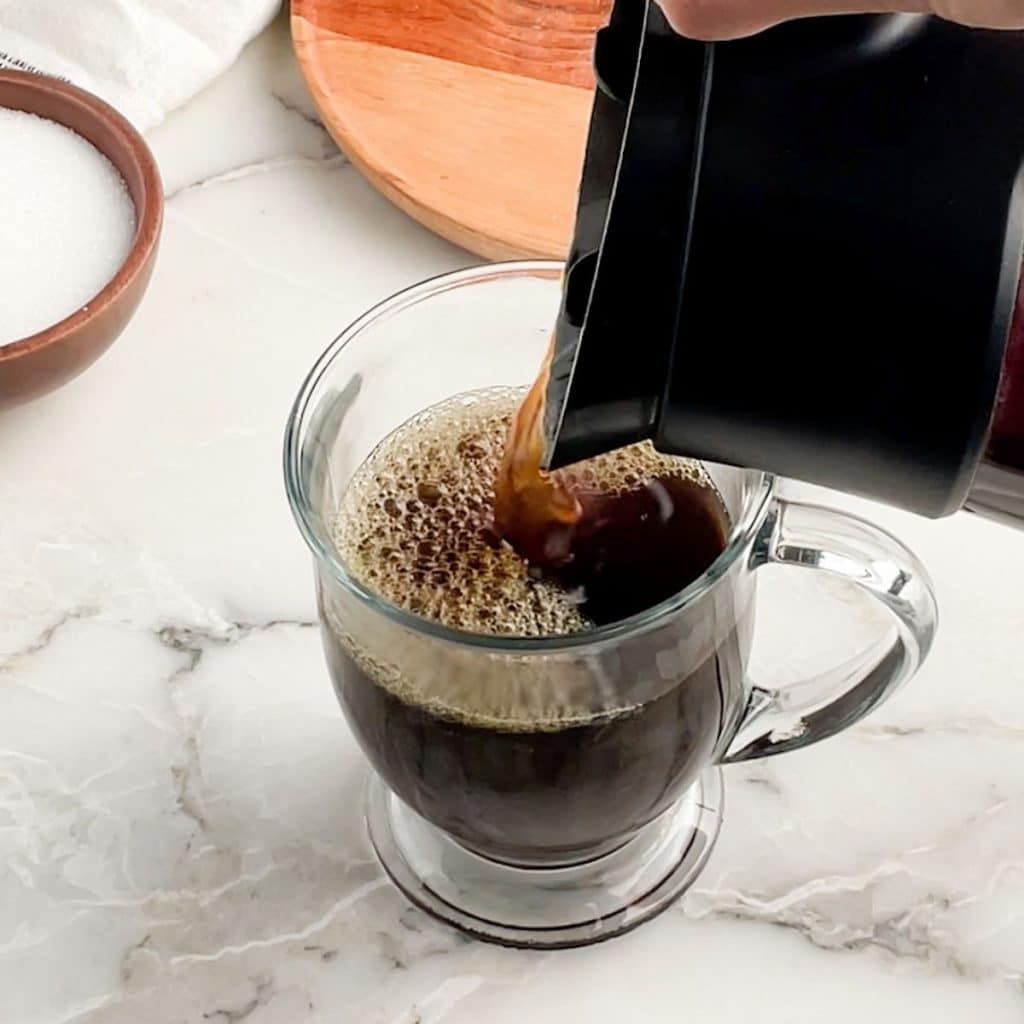 Coffee pouring into a mug.