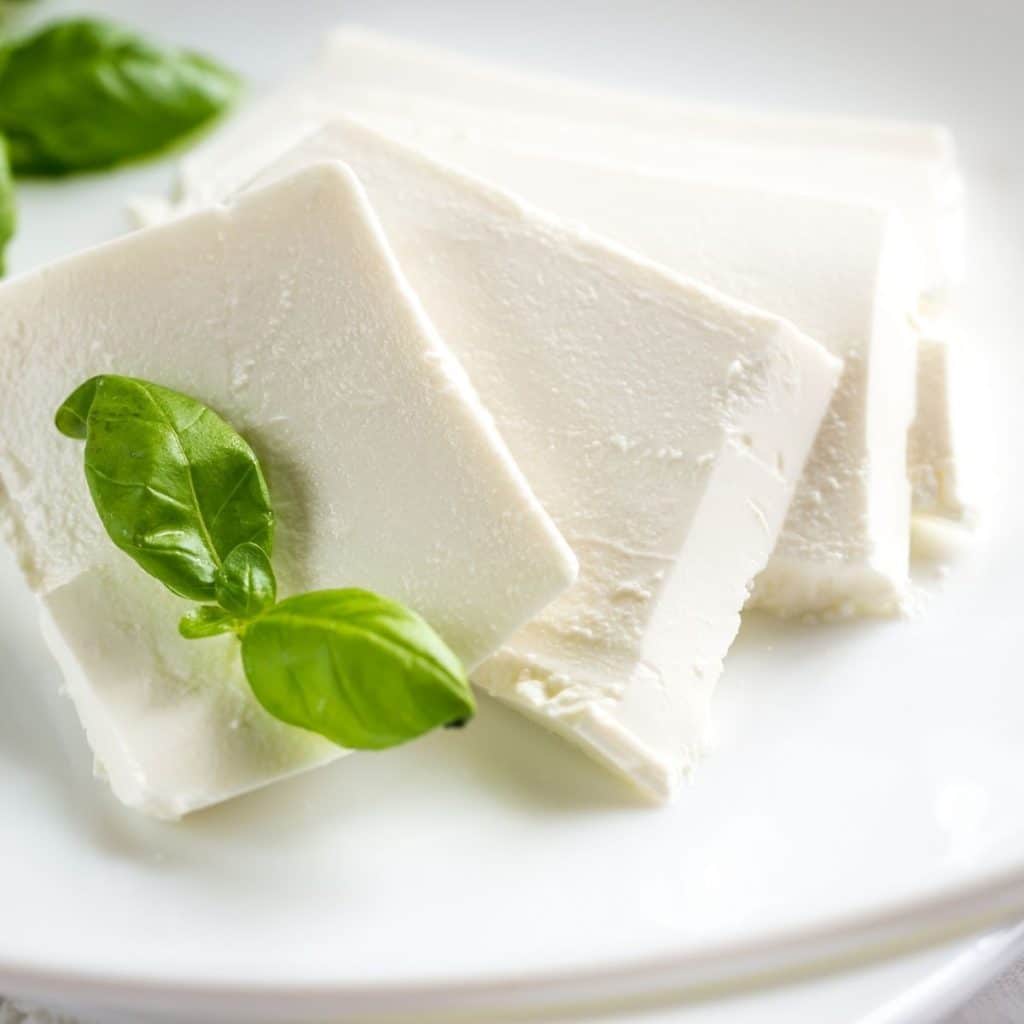 Plate of ricotta salata cheese.