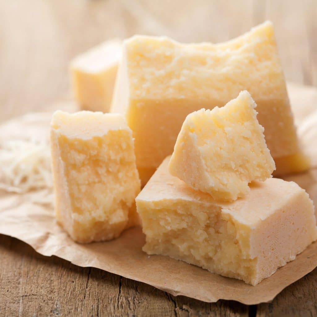 Chunks of parmesan cheese. 