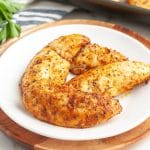 Plate of cooked chicken tenders.