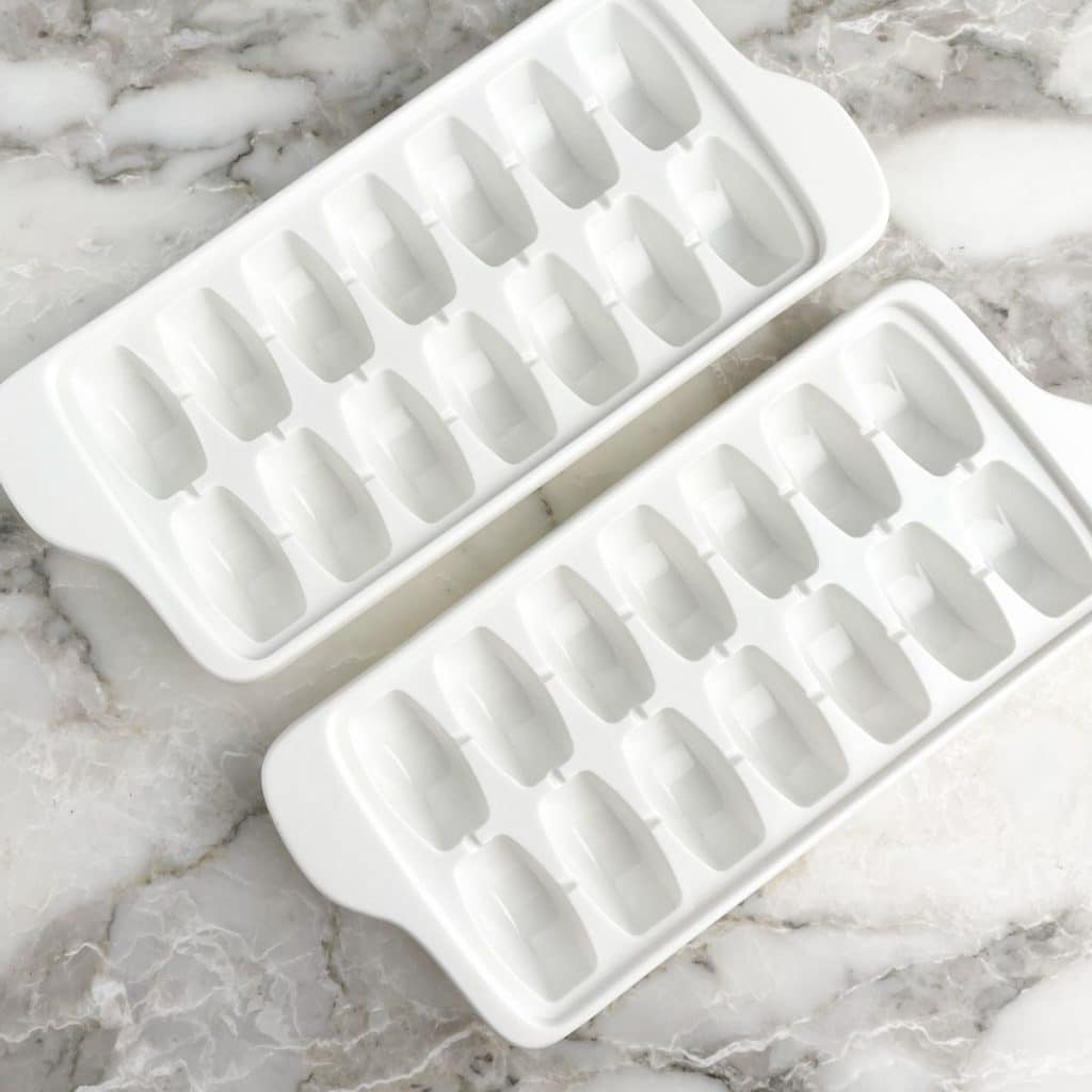 Two white ice cube trays.