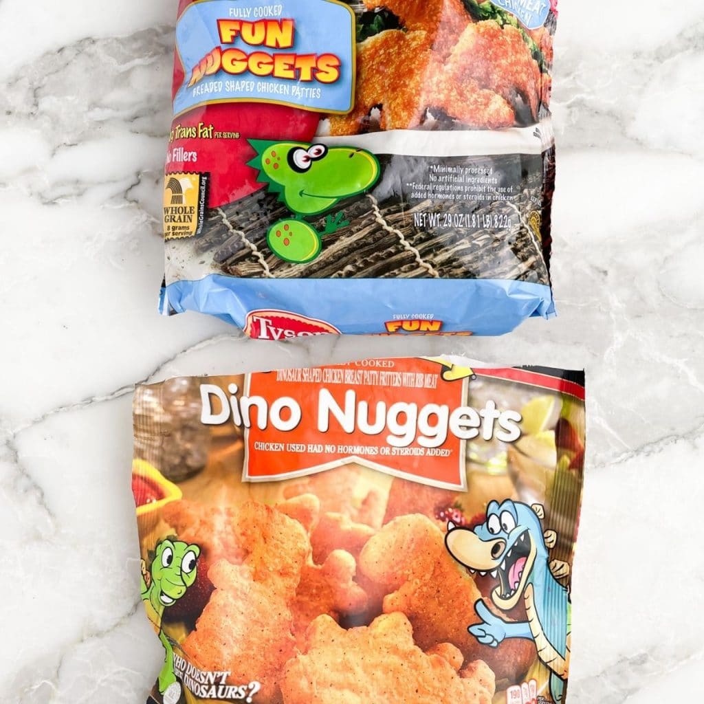Two bags of frozen dino nuggets.