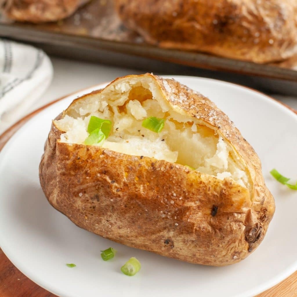 Baked potato on a plate. 