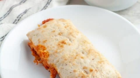 Cooked hot pocket on a plate.