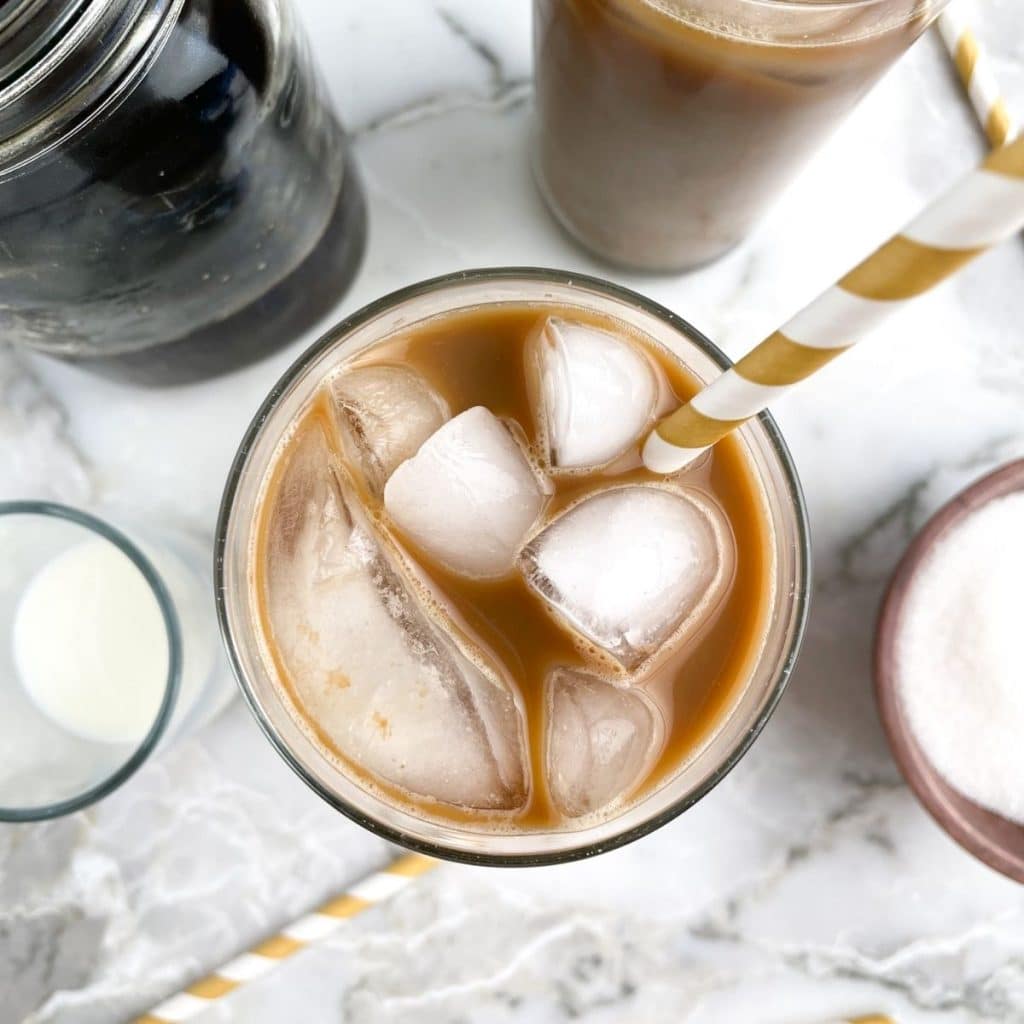 Top down shot of glass of iced coffee.