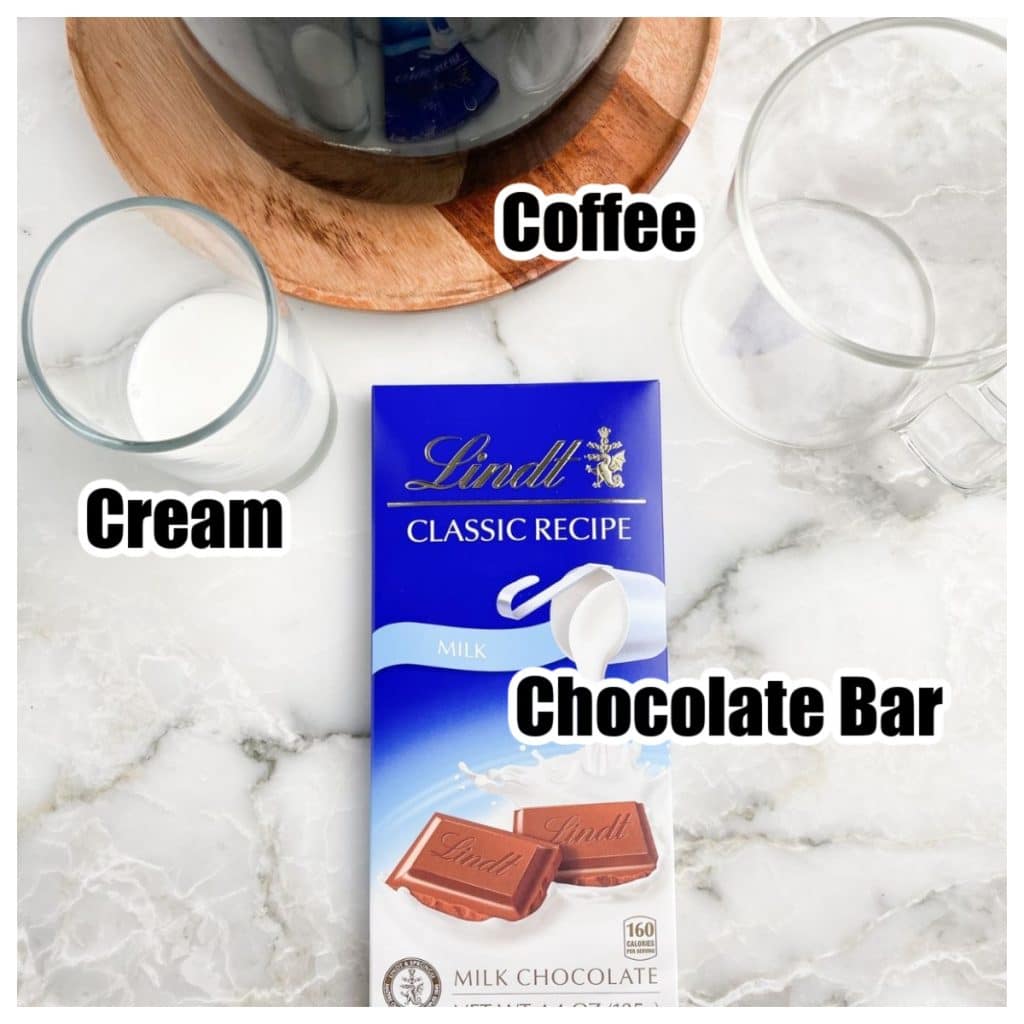 Chocolate bar, cup of cream, and coffee.