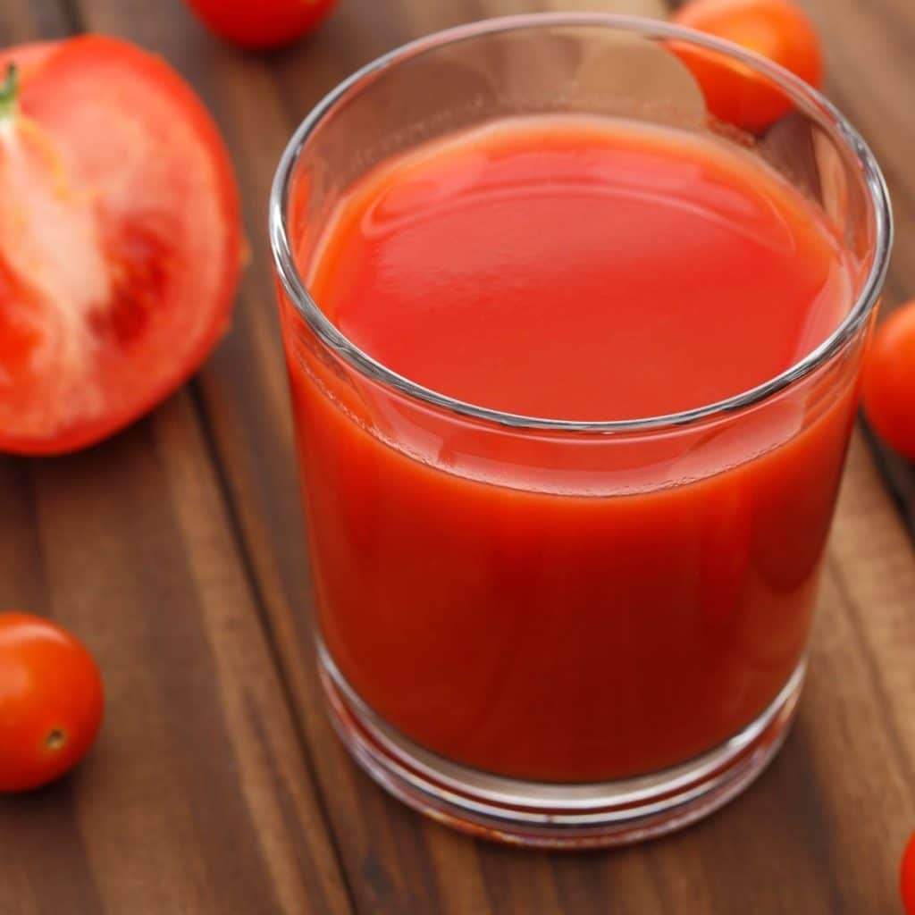 Glass of tomato juice.