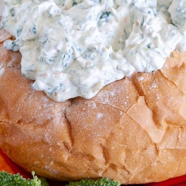 Bread bowl with spinach dip.