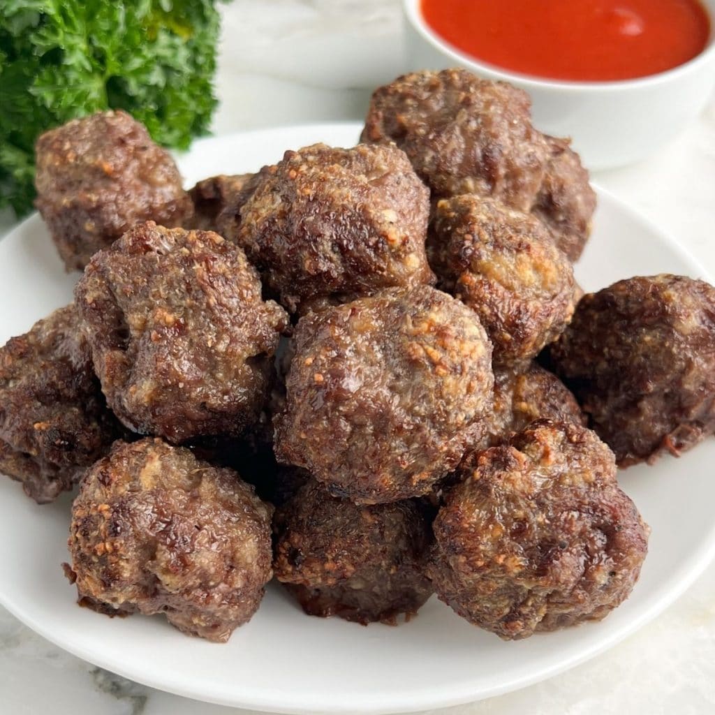 Cooked meatballs on a plate.