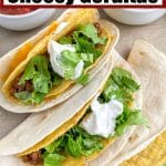 Three gorditas and bowl of salsa.
