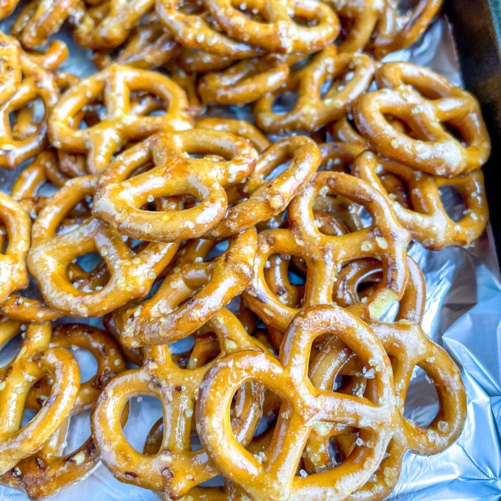 Mini pretzels on a baking sheet. 