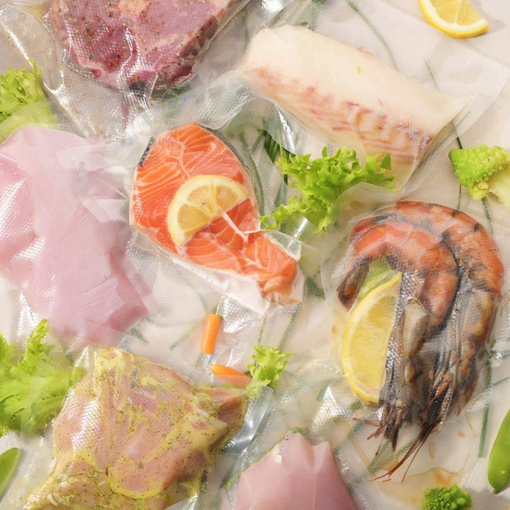 Salmon, chicken, and steak in sous vide bags. 