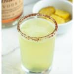 Shot glass with pickle juice.