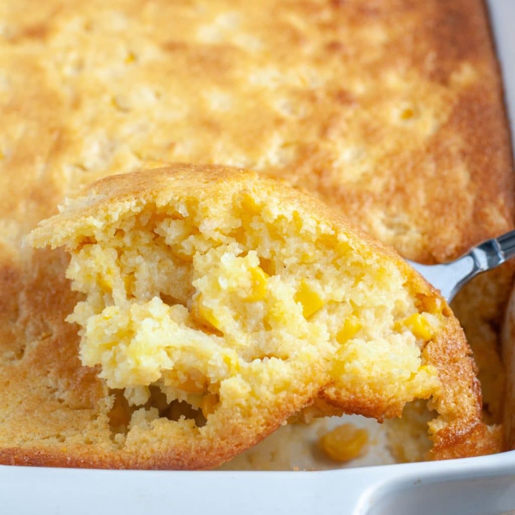 Spoon with corn pudding.