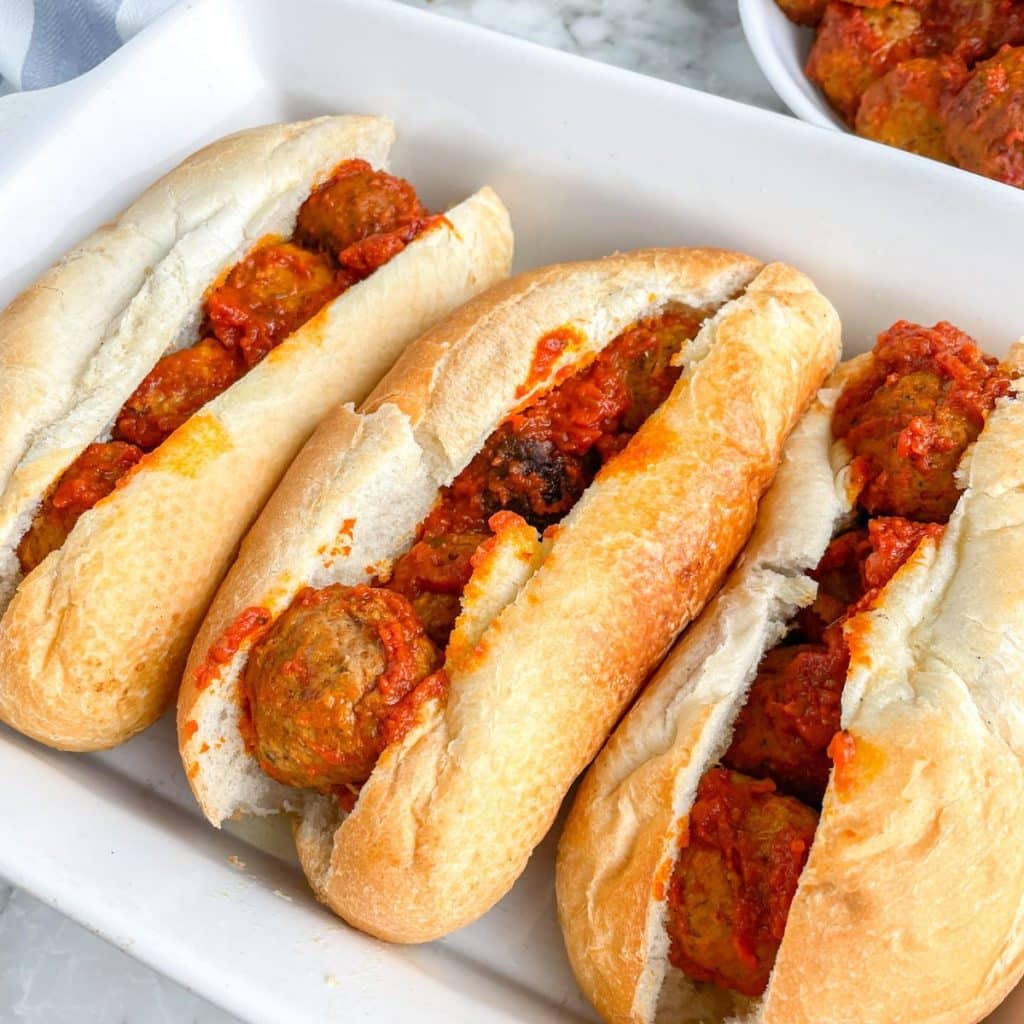 Casserole dish with meatball subs.
