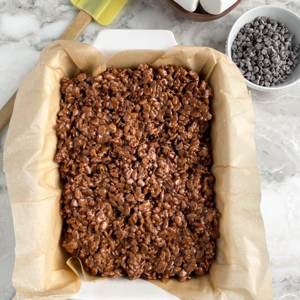 Baking dish with cocoa krispie treats. 