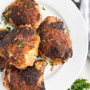 A plate of chicken thighs.