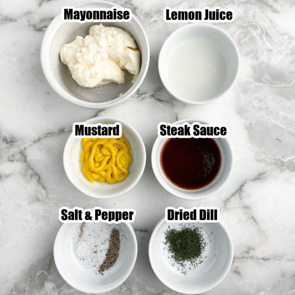 Bowl of mayonnaise, lemon juice, mustard, steak sauce, and seasonings. 
