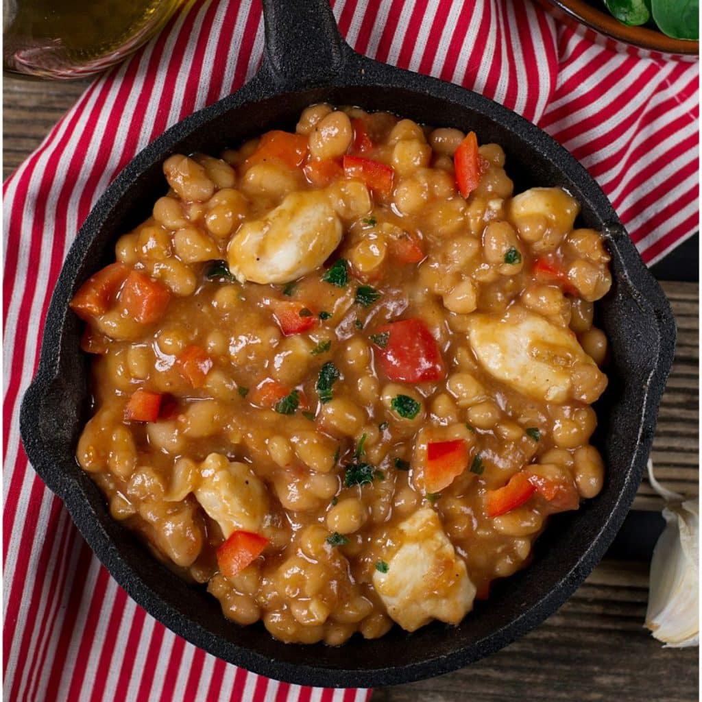 Skillet of chicken and bean soup. 