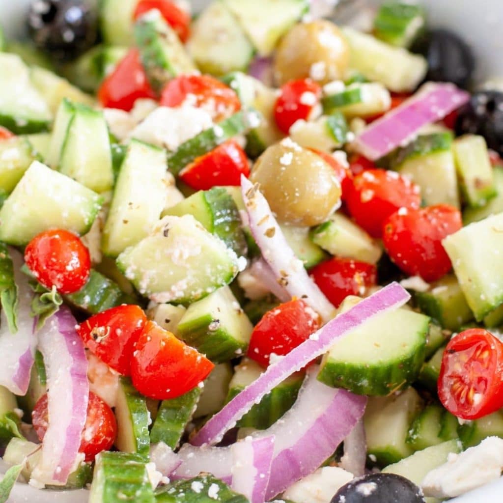 Cucumber salad with onions and tomatoes.