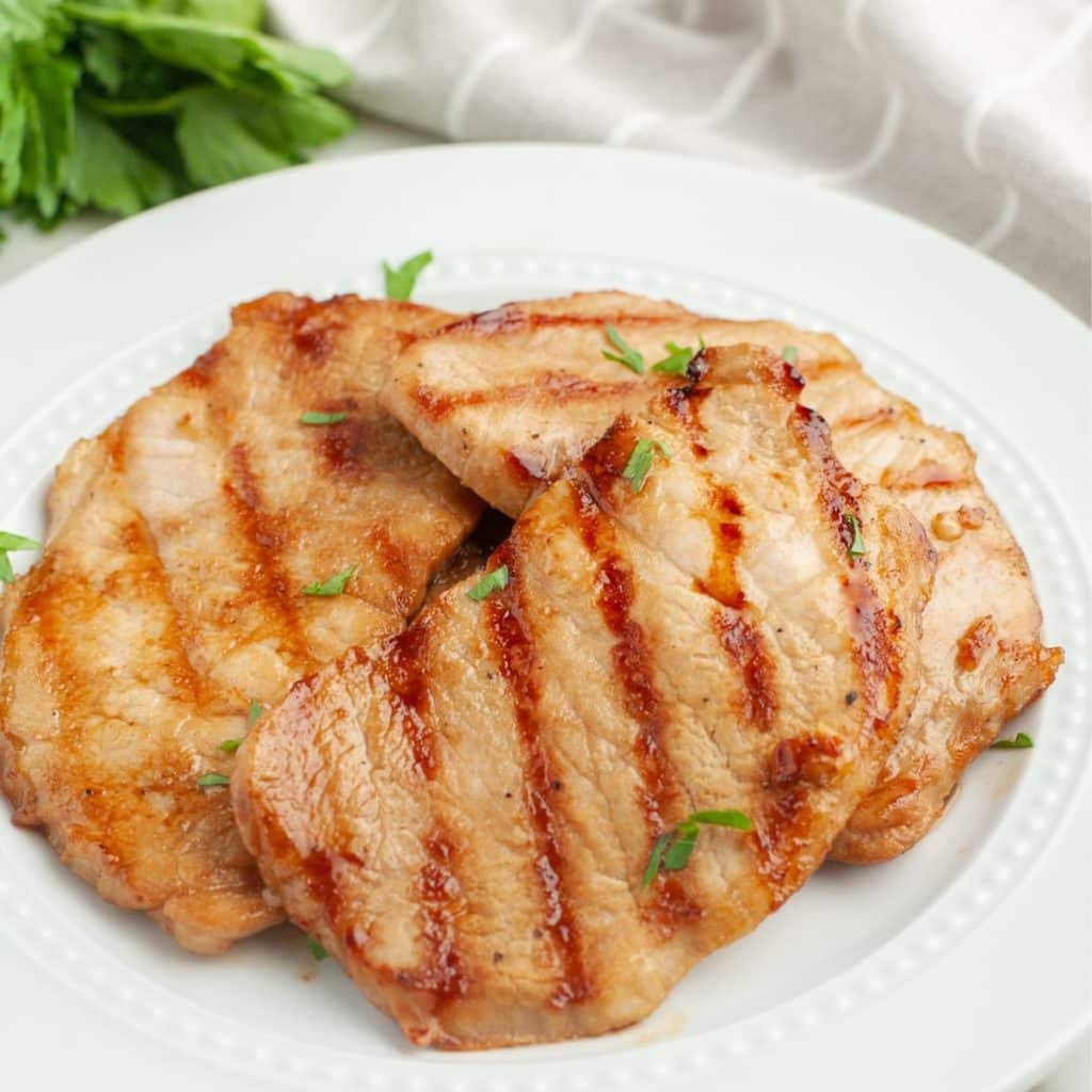 Plate of grilled pork chops. 