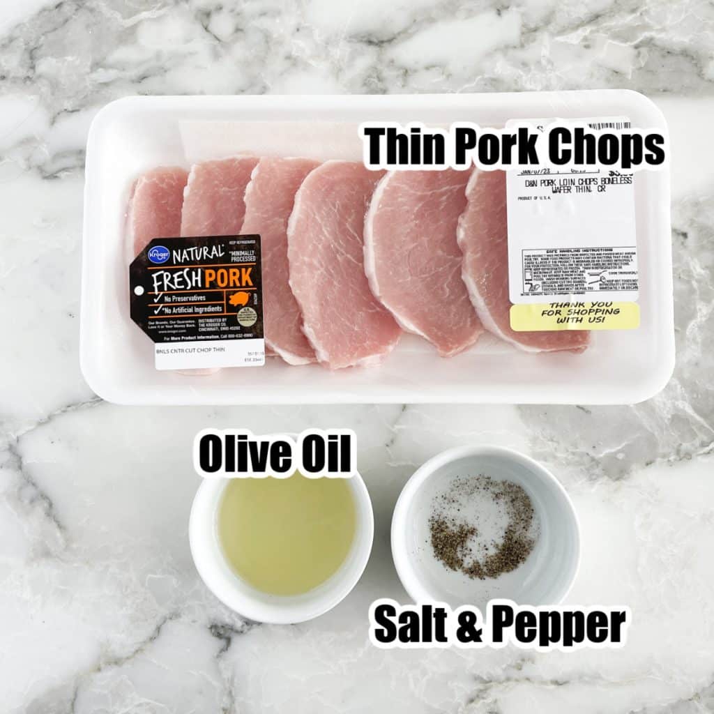 Package of thin pork chops, bowl of oil, salt and pepper. 