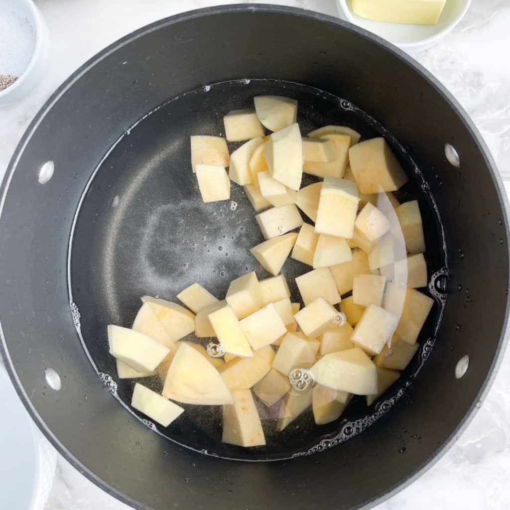Pot with cubed rutabaga.