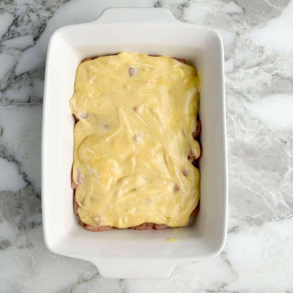 Casserole dish with cream of chicken soup. 