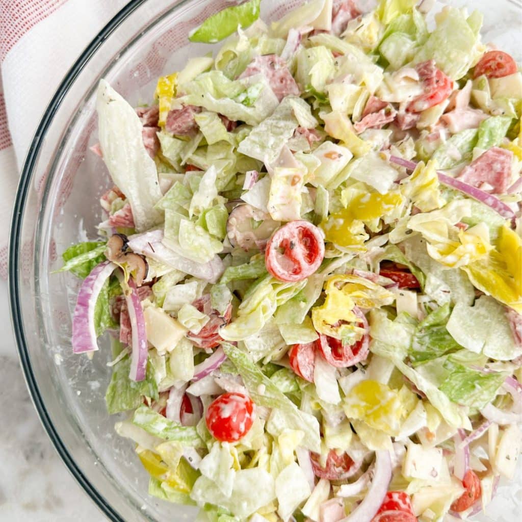 Chopped salad in a glass bowl. 