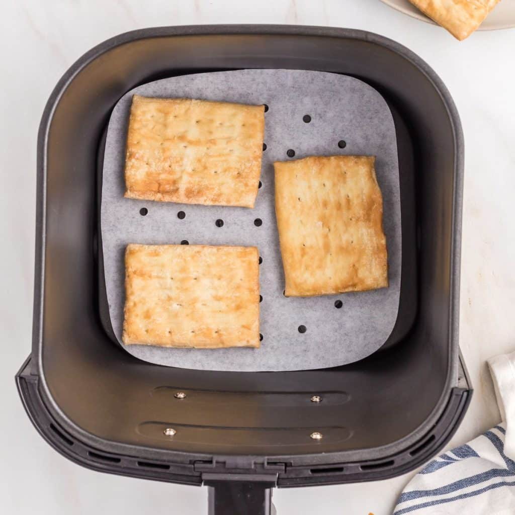 Toaster strudel in air fryer basket.