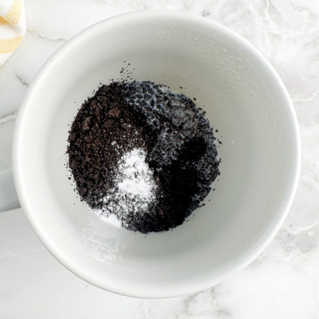 Chocolate cookie crumbs in a mug. 