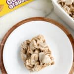 Plate with cereal treat and box of Golden Grahams.
