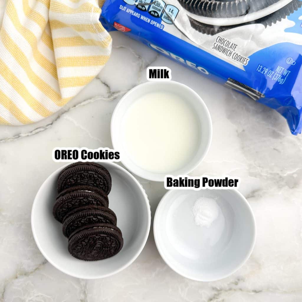 Bowl of Oreos, milk, and baking powder. 