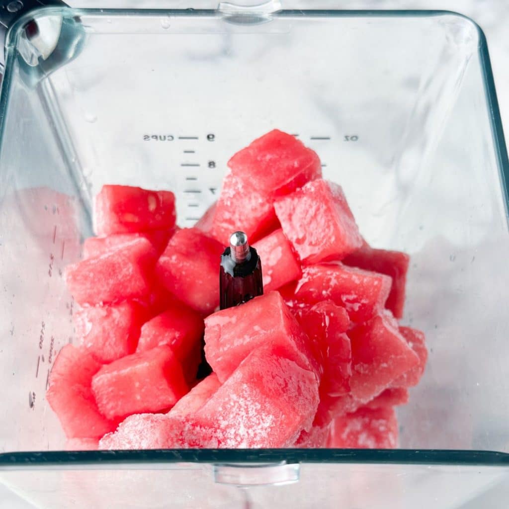Frozen watermelon cubes in a blender. 