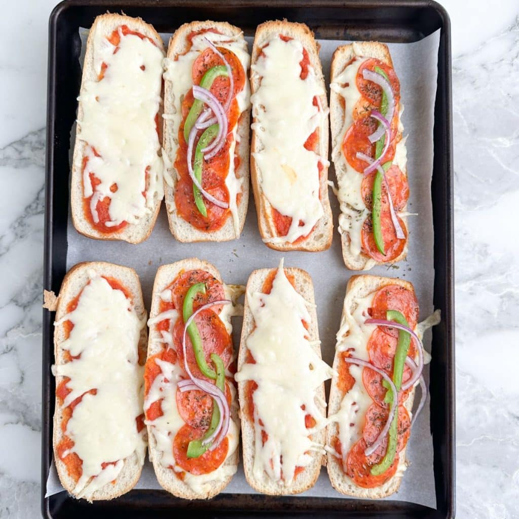 Pizza sandwiches on a pan. 