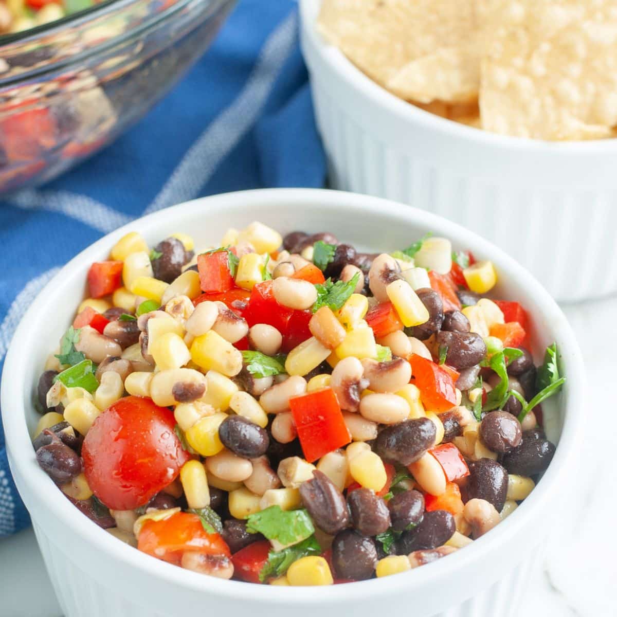 Bowl full of corn and bean salad.