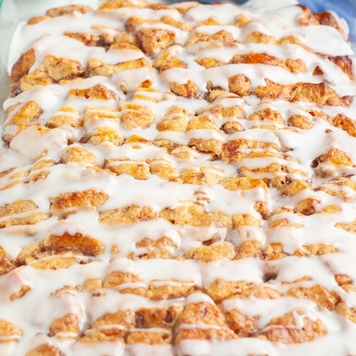 Cinnamon roll casserole with icing.