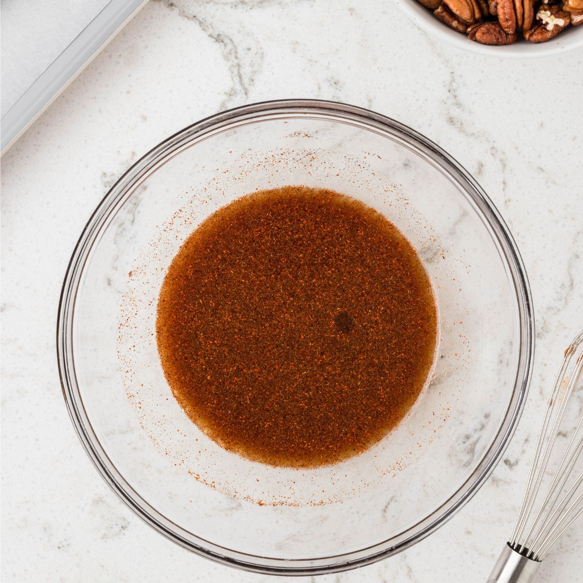 Bowl of pecan glaze mixture. 