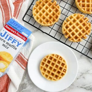 Mini waffles on a plate and cooling wrack.