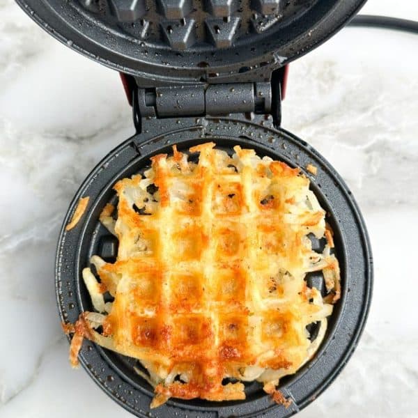 Hash browns in a waffle maker.