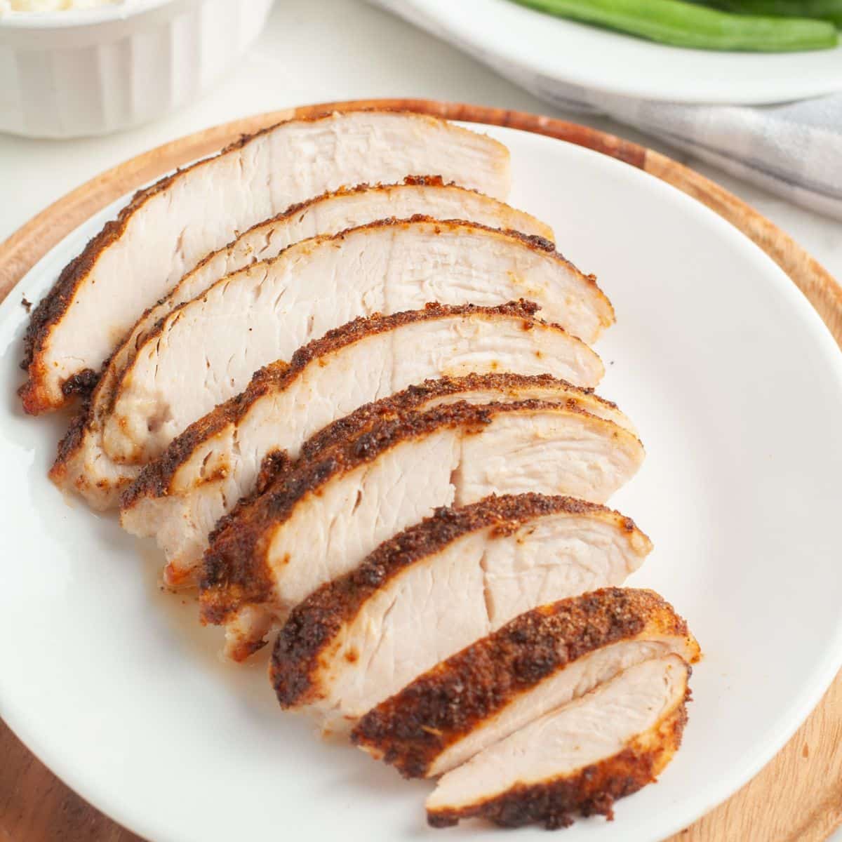 Sliced turkey tenderloin on a plate. 