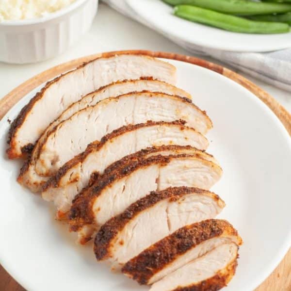 Plate with sliced turkey.