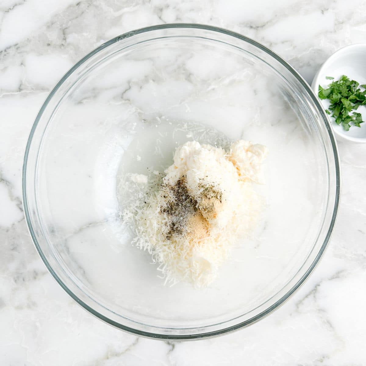 Bowl mayonnaise, garlic powder, and seasonings. 